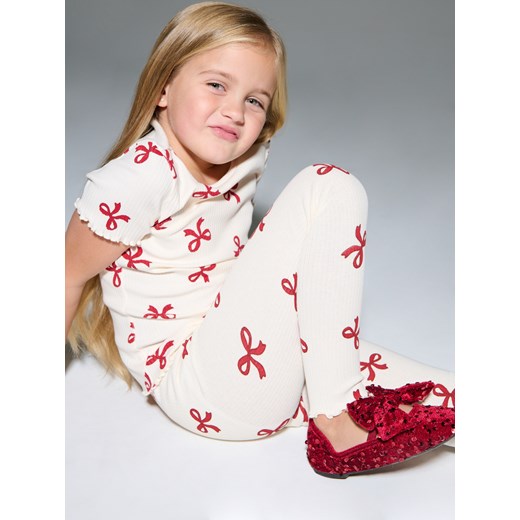 Sinsay - Prążkowane legginsy ze wzorem w kokardy - wielobarwny Sinsay 116 (5-6 l) Sinsay