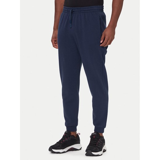 Rossignol Spodnie dresowe RLOMP12 Granatowy Regular Fit ze sklepu MODIVO w kategorii Spodnie męskie - zdjęcie 186504949