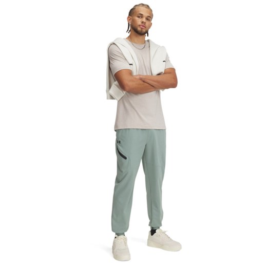 Męskie spodnie treningowe Under Armour UA Unstoppable Joggers - zielone ze sklepu Sportstylestory.com w kategorii Spodnie męskie - zdjęcie 186512226
