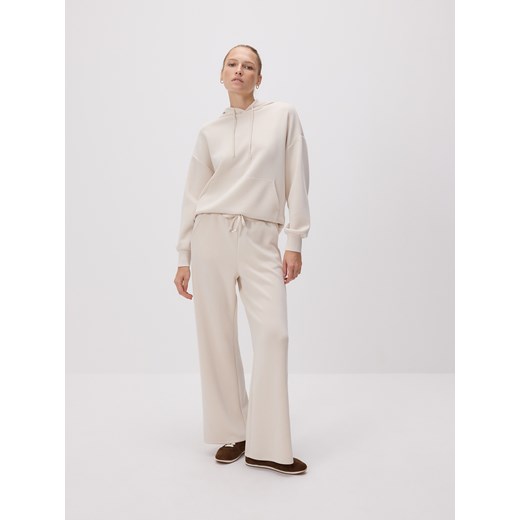 Reserved - Dresowe spodnie z modalem - beżowy ze sklepu Reserved w kategorii Spodnie damskie - zdjęcie 186516997