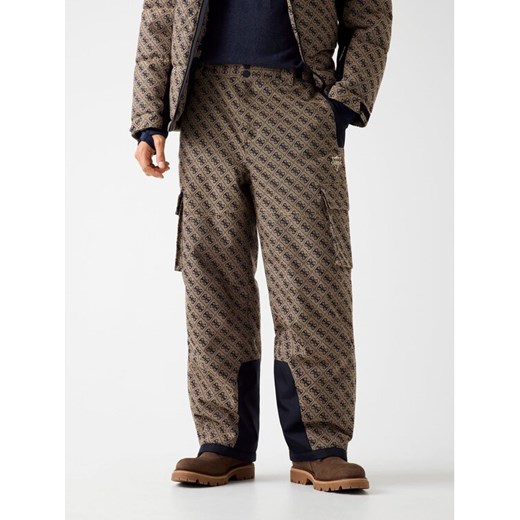 Guess Spodnie materiałowe 179583 Beżowy Regular Fit ze sklepu MODIVO w kategorii Spodnie męskie - zdjęcie 186521667