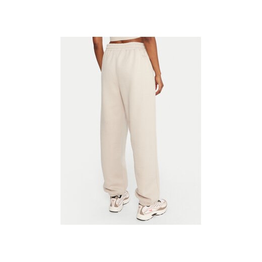 Reebok Spodnie dresowe Reebok X Ewa Chodakowska RK25304CCW Beżowy Regular Fit Reebok XL MODIVO