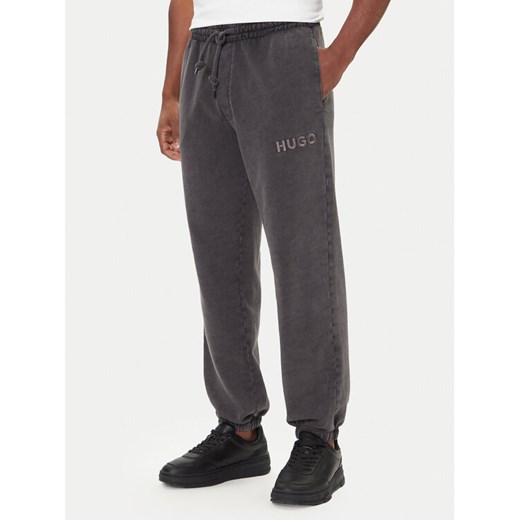 HUGO Spodnie dresowe Delwony 50546385 Szary Relaxed Fit ze sklepu MODIVO w kategorii Spodnie męskie - zdjęcie 186525575