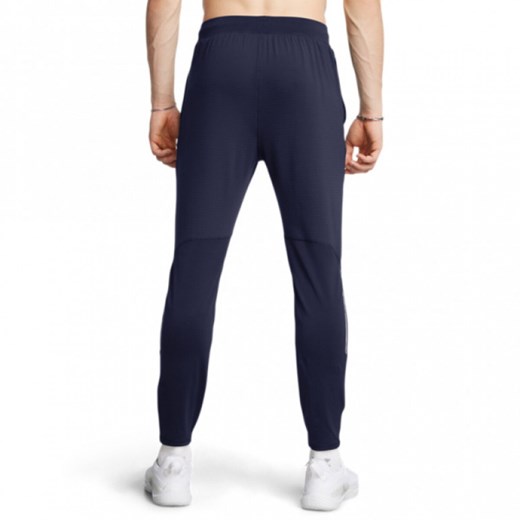 Męskie spodnie treningowe Under Armour UA Vanish Cw Fitted Pant - granatowe ze sklepu Sportstylestory.com w kategorii Spodnie męskie - zdjęcie 186547927