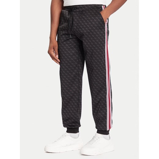 Guess Spodnie dresowe Z5BB19 K2042 Czarny Regular Fit ze sklepu MODIVO w kategorii Spodnie męskie - zdjęcie 186553967
