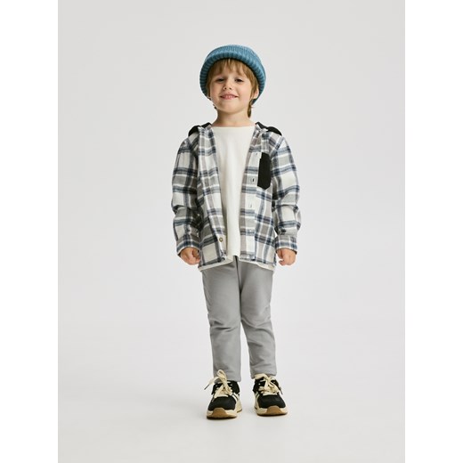 Reserved - Bawełniane legginsy - ciemnoszary - id: 093FO-90X - marki Reserved - 186565336 Reserved - Bawełniane legginsy - ciemnoszary ze sklepu Reserved w kategorii Spodnie chłopięce - zdjęcie 186565336