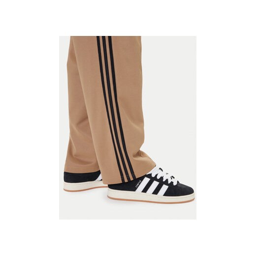 adidas Spodnie dresowe adicolor Firebird JY1419 Beżowy Baggy Fit S MODIVO