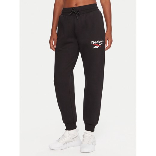 Reebok Spodnie dresowe Stacey RK25166CCW Czarny Regular Fit ze sklepu MODIVO w kategorii Spodnie damskie - zdjęcie 186576567