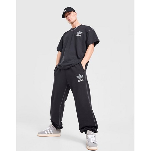 ADIDAS SPODNIE GFX PT LO ze sklepu JD Sports  w kategorii Spodnie męskie - zdjęcie 186612146