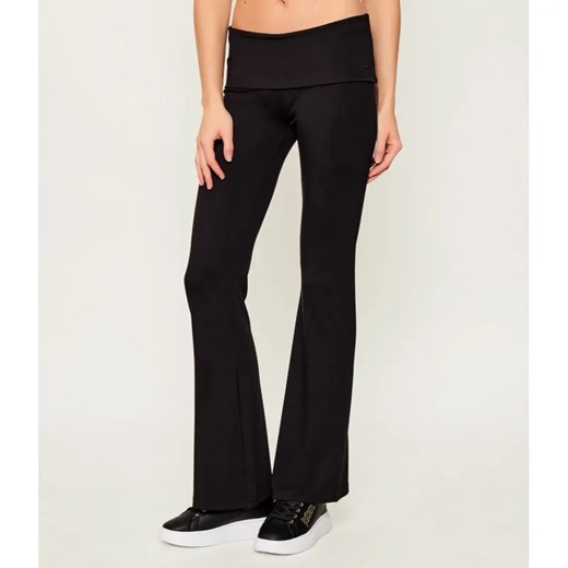 Juicy Couture Spodnie dresowe STEVEN ROLL DOWN | flare fit ze sklepu Gomez Fashion Store w kategorii Spodnie damskie - zdjęcie 186650966