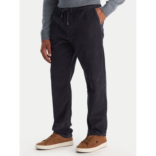 Quiksilver Spodnie materiałowe Taxer EQYNP03315 Granatowy Loose Fit ze sklepu MODIVO w kategorii Spodnie męskie - zdjęcie 186655256