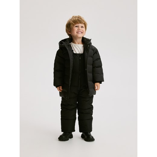 Reserved - Ogrodniczki z ociepleniem - czarny - id: WB929-99X - marki Reserved - 186661246 Reserved - Ogrodniczki z ociepleniem - czarny ze sklepu Reserved w kategorii Spodnie chłopięce - zdjęcie 186661246