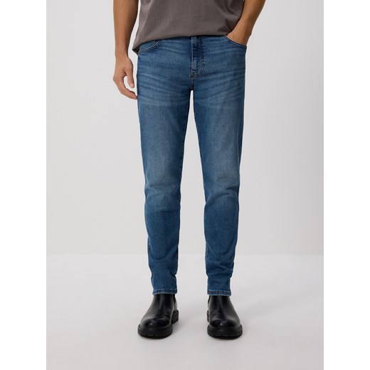 Reserved - Jeansy slim z efektem sprania - niebieski ze sklepu Reserved w kategorii Jeansy męskie - zdjęcie 186672765