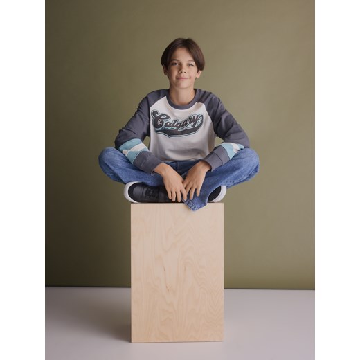 Reserved - Bawełniany longsleeve - złamana biel ze sklepu Reserved w kategorii T-shirty chłopięce - zdjęcie 186673097