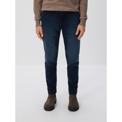 Reserved - Jeansy slim fit z efektem sprania - granatowy Reserved 34 Reserved