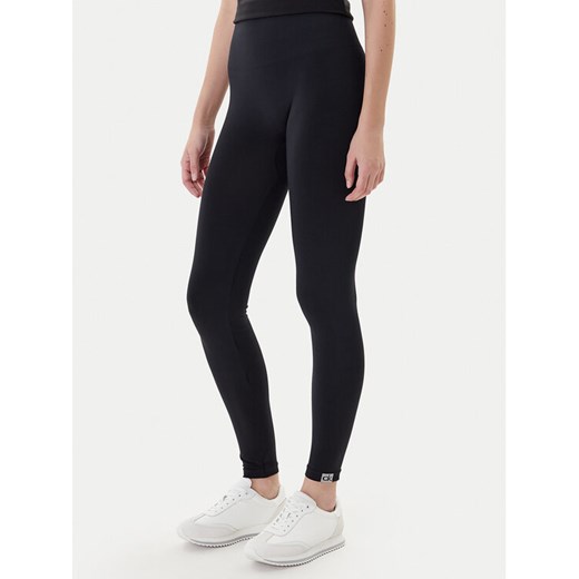 Calvin Klein Legginsy 701233681 Czarny Slim Fit ze sklepu MODIVO w kategorii Spodnie damskie - zdjęcie 186680078