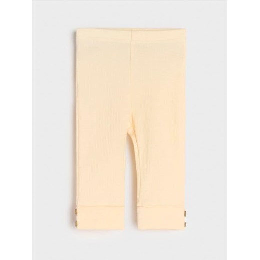 Sinsay - Legginsy z ozdobnymi guzikami przy nogawkach - kremowy ze sklepu Sinsay w kategorii Spodnie i półśpiochy - zdjęcie 186704927