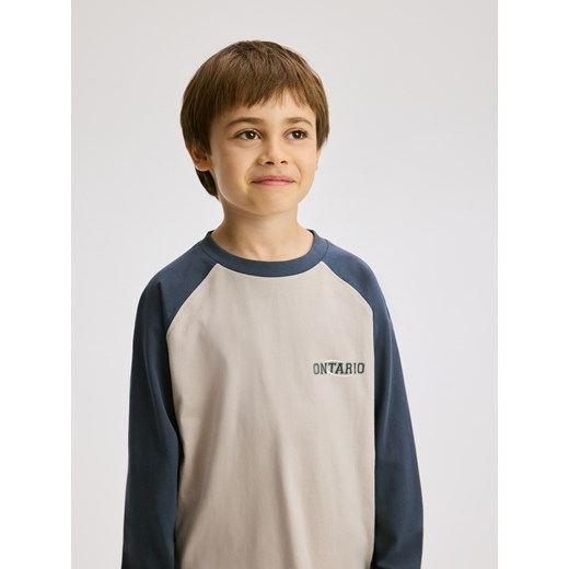 Reserved - Bawełniany longsleeve z nadrukiem - kremowy Reserved 116 (5-6 lat) Reserved