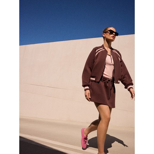 Mohito - Skórzane sneakersy - różowy ze sklepu Mohito w kategorii Buty sportowe damskie - zdjęcie 186719546