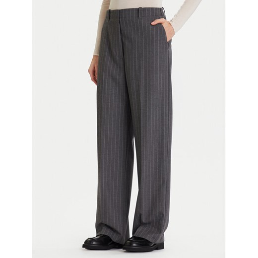 Tommy Hilfiger Spodnie materiałowe WW0WW47550 Szary Wide Leg ze sklepu MODIVO w kategorii Spodnie damskie - zdjęcie 186729349