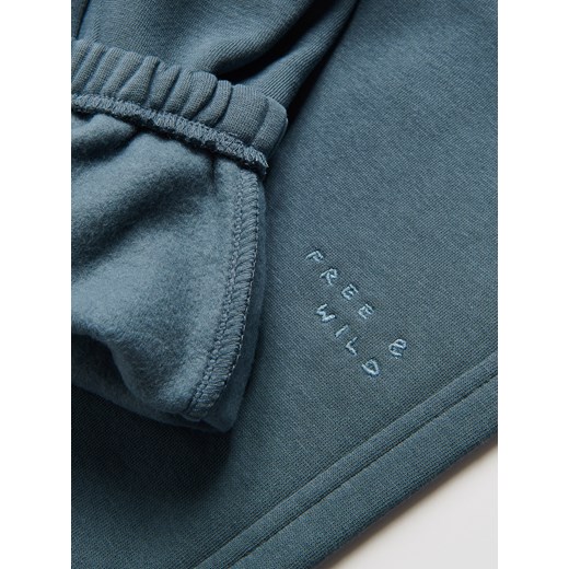 Reserved - Ocieplane spodnie jogger - granatowy - id: 154FI-95X - marki Reserved - 186734356 Reserved - Ocieplane spodnie jogger - granatowy ze sklepu Reserved w kategorii Spodnie chłopięce - zdjęcie 186734356