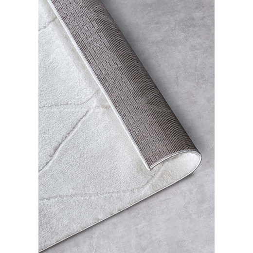 Elle Decoration Dywan &quot;Perrotin&quot; w kolorze kremowym Elle Decoration 80x240 cm wyprzedaż Limango Polska