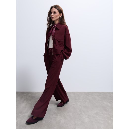 Mohito - Sztruksowe bordowe spodnie - kasztanowy ze sklepu Mohito w kategorii Spodnie damskie - zdjęcie 186758547