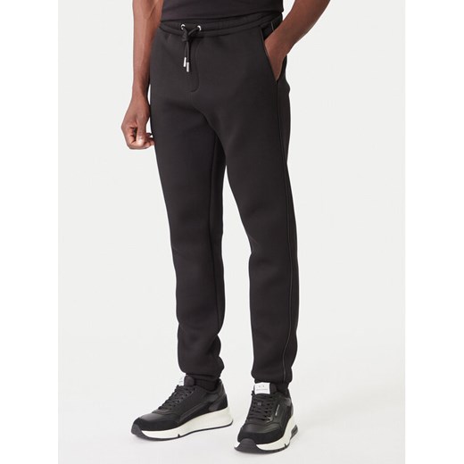 KARL LAGERFELD Spodnie dresowe 705040 554907 Czarny Regular Fit ze sklepu MODIVO w kategorii Spodnie męskie - zdjęcie 186795398
