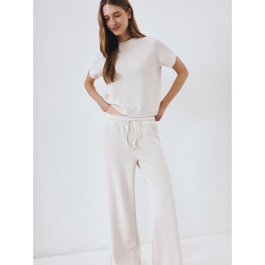 Reserved - Spodnie dresowe z modalem - beżowy Reserved M promocja Reserved