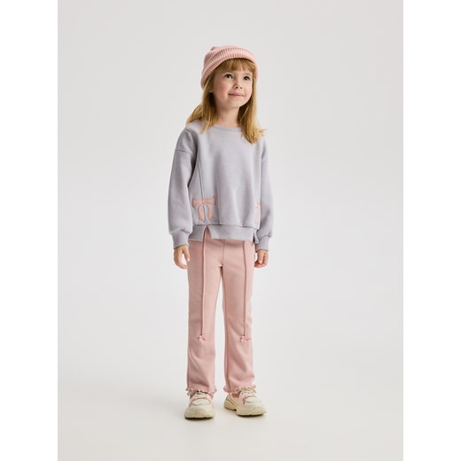 Reserved - Ocieplane spodnie flare - brudny róż ze sklepu Reserved w kategorii Spodnie dziewczęce - zdjęcie 186803475