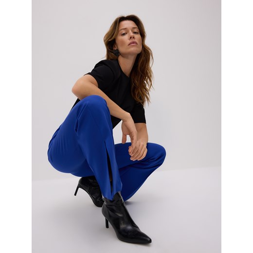 Reserved - Spodnie z rozcięciami long leg - niebieski ze sklepu Reserved w kategorii Spodnie damskie - zdjęcie 186816737