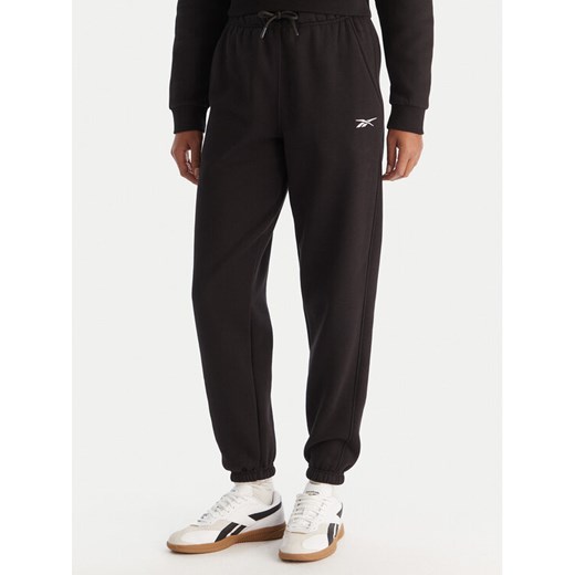 Reebok Spodnie dresowe Reebok X Ewa Chodakowska Evren RK25308CCW Czarny Regular Fit ze sklepu MODIVO w kategorii Spodnie damskie - zdjęcie 186818266