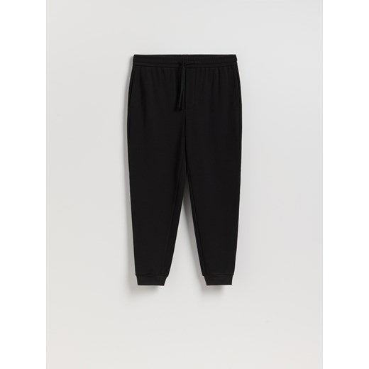 Reserved - Spodnie dresowe regular fit - czarny ze sklepu Reserved w kategorii Spodnie męskie - zdjęcie 186825055