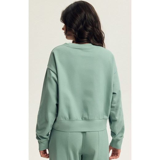 Esotiq bluza damska Bloovii Keithan 43785-07X, Kolor matcha, Rozmiar M, BLOOVII - id: 220905 - marki Bloovii - 187056748 Esotiq bluza damska Bloovii Keithan 43785-07X, Kolor matcha, Rozmiar M, BLOOVII ze sklepu Primodo w kategorii Bluzy damskie - zdjęcie 187056748