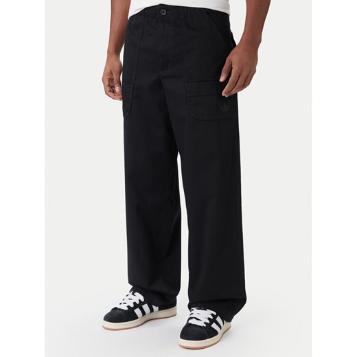 adidas Spodnie materiałowe Premium Essentials JY2636 Czarny Loose Fit ze sklepu MODIVO w kategorii Spodnie męskie - zdjęcie 187233256