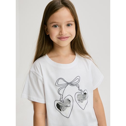 Reserved - T-shirt z cekinową aplikacją - złamana biel ze sklepu Reserved w kategorii Bluzki dziewczęce - zdjęcie 187240776