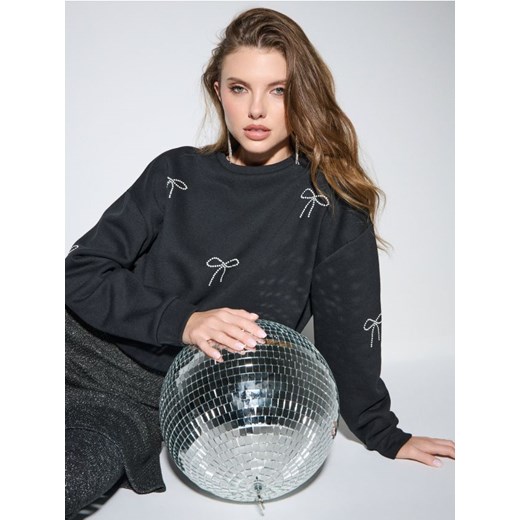 Sinsay - Bluza crewneck ze wzorem w kokardy - czarny ze sklepu Sinsay w kategorii Bluzy damskie - zdjęcie 187259169