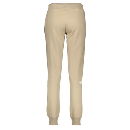 The North Face Spodnie dresowe w kolorze beżowym The North Face L promocja Limango Polska