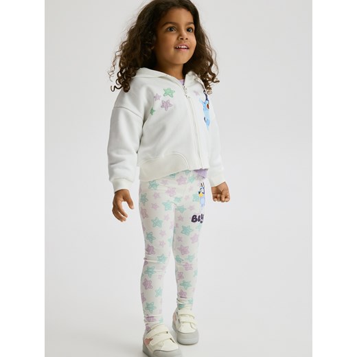 Reserved - Bawełniane legginsy Bluey - złamana biel ze sklepu Reserved w kategorii Spodnie dziewczęce - zdjęcie 187269078