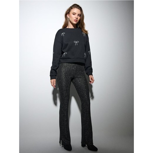 Sinsay - Spodnie flare z metalizowaną nicią - czarny ze sklepu Sinsay w kategorii Spodnie damskie - zdjęcie 187276337