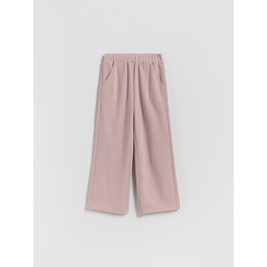 Reserved - Dzianinowe spodnie z haftem - brudny róż - id: 063FG-39M - marki Reserved - 187290388 Reserved - Dzianinowe spodnie z haftem - brudny róż ze sklepu Reserved w kategorii Spodnie dziewczęce - zdjęcie 187290388