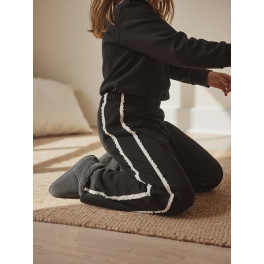 Sinsay - Spodnie dresowe wide leg - czarny Sinsay 110 (4-5 l) Sinsay