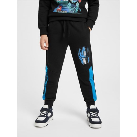Sinsay - Spodnie dresowe Transformers - czarny ze sklepu Sinsay w kategorii Spodnie chłopięce - zdjęcie 187333295