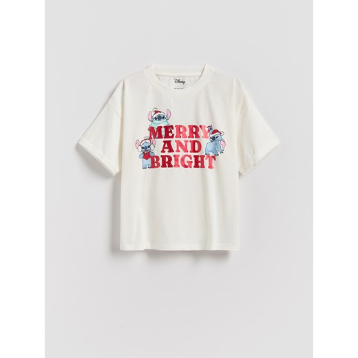 Reserved - Świąteczny t-shirt Lilo i Stitch - złamana biel ze sklepu Reserved w kategorii Bluzki dziewczęce - zdjęcie 187334026