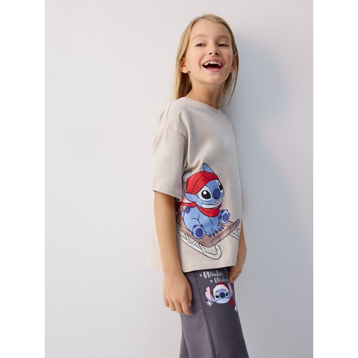 Reserved - Świąteczny t-shirt Lilo i Stitch - beżowy ze sklepu Reserved w kategorii Bluzki dziewczęce - zdjęcie 187334035