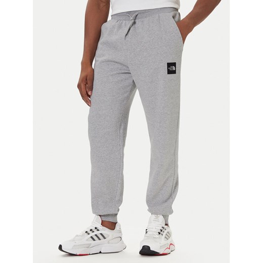 The North Face Spodnie dresowe Fine NF0A8C1K Szary Tapered Fit ze sklepu MODIVO w kategorii Spodnie męskie - zdjęcie 187481219