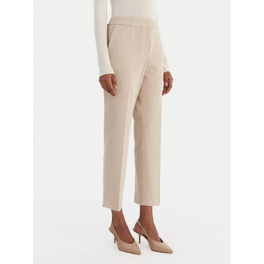 BOSS Spodnie materiałowe Tapria 50555740 Beżowy Slim Fit ze sklepu MODIVO w kategorii Spodnie damskie - zdjęcie 187481235