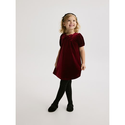 Reserved - Welurowa sukienka z kokardą - czerwony ze sklepu Reserved w kategorii Sukienki dziewczęce - zdjęcie 187509019