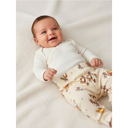 Sinsay - Spodnie z polarem w środku ze świątecznym motywem Winnie the Pooh - kremowy ze sklepu Sinsay w kategorii Odzież dla niemowląt - zdjęcie 187513708