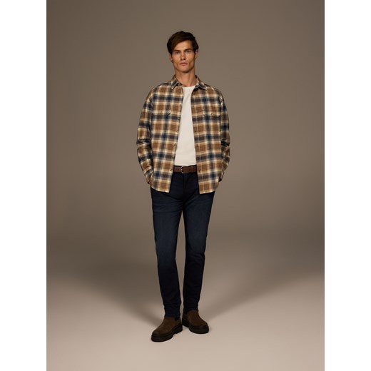 Reserved - Jeansy slim fit z efektem sprania - granatowy Reserved 31 Reserved